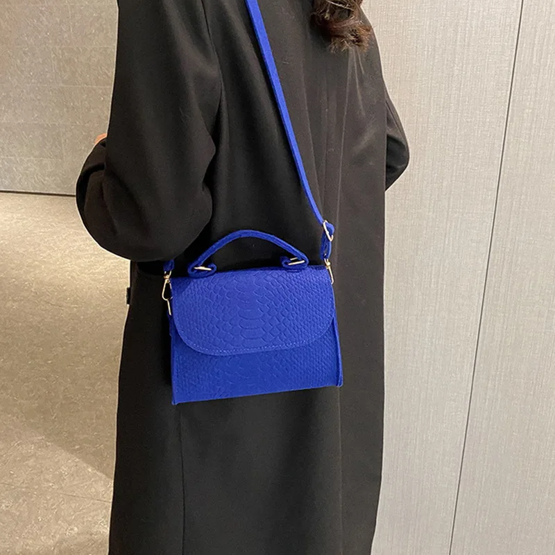Leather bag bag buttons Korea new fashion shoulder bag ladies bags wholesale cross retro trend