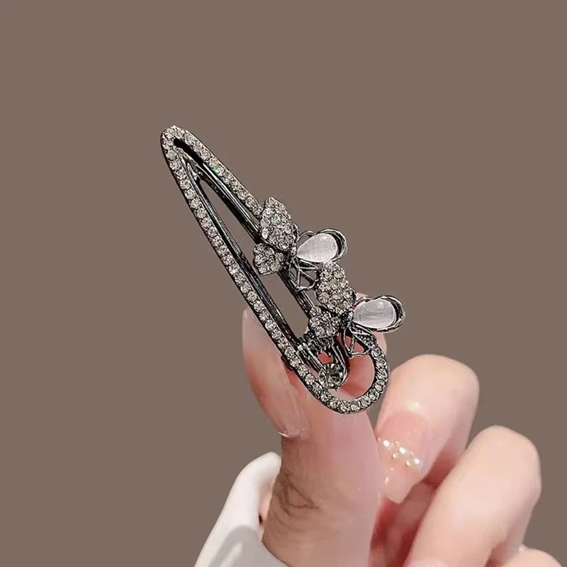 Neue Temperament schwarze Blume Haars pange exquisite Strass Haars pangen Seite Pony Clip hohle Haarnadel Frauen Haarschmuck – Detail 3