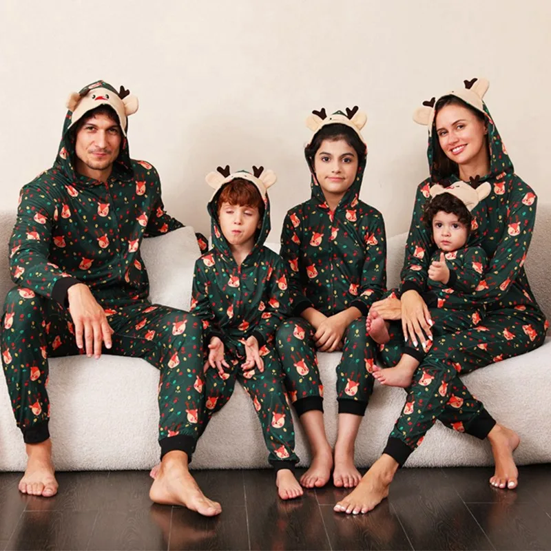 

Snuggly Matching Family Pajama Sets with Festive Cartoon Prints Festive Family Wear Perfect for Christmas and Holidays