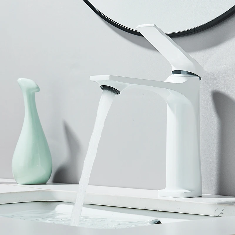 Gun grey faucet resting on countertop for display