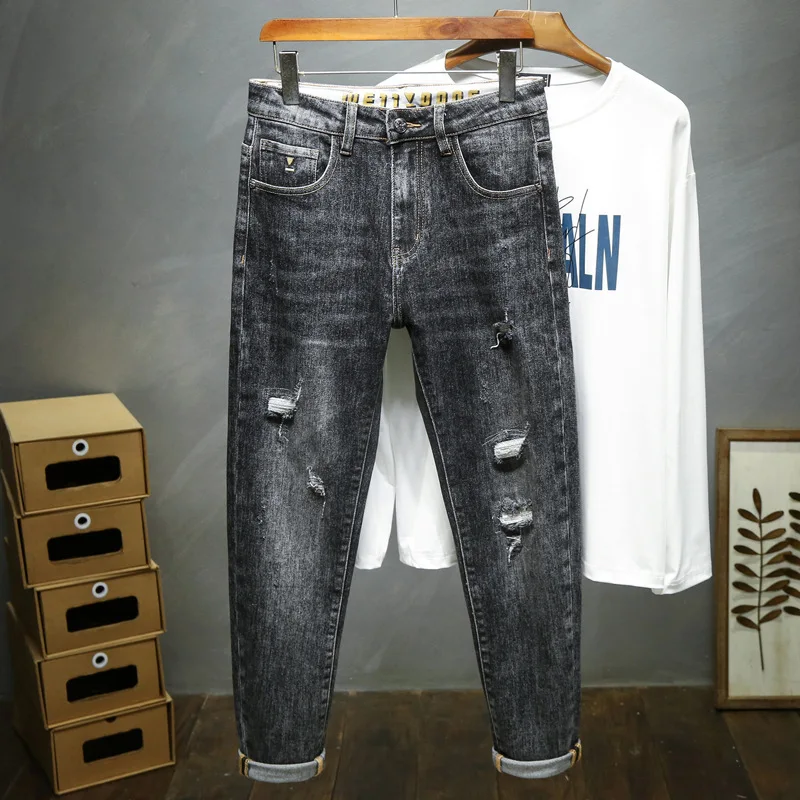 

Autumn and winter new men's slim slim straight leg jeans ripped stretch pants