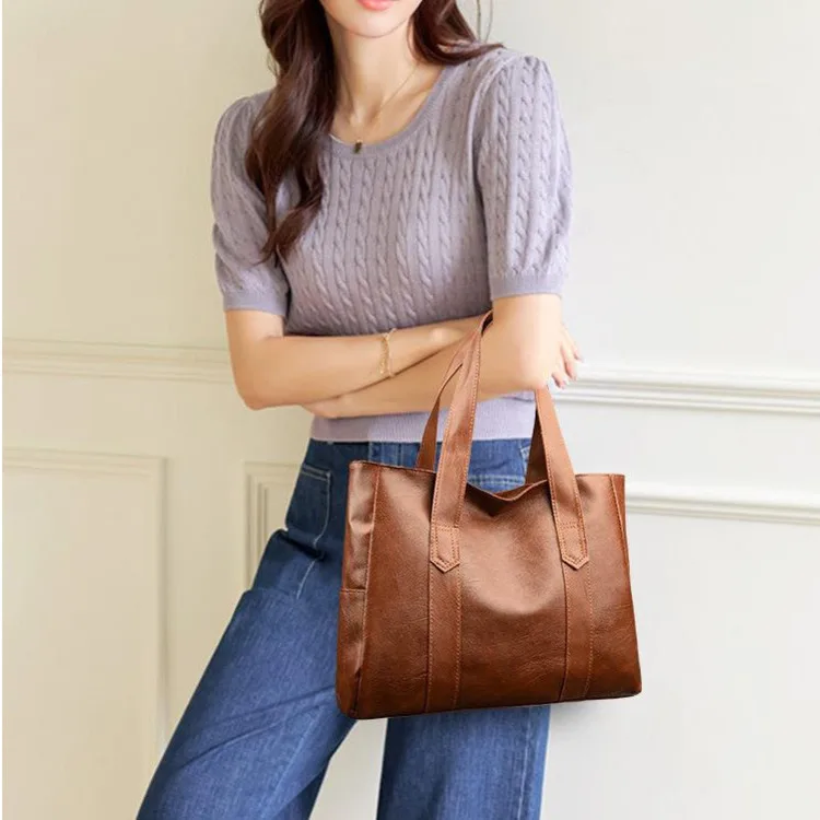 2024 European and American New Fashion Simple PU Soft Leather Trendy Handheld Tote Bag Large Capacity Shoulder Bag for Women_voghion.com
