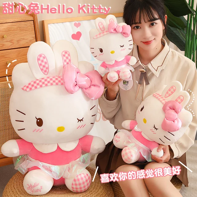 Sanrio Hello Kitty - Peluche de mezclilla (9.8 in) (cinta roja)