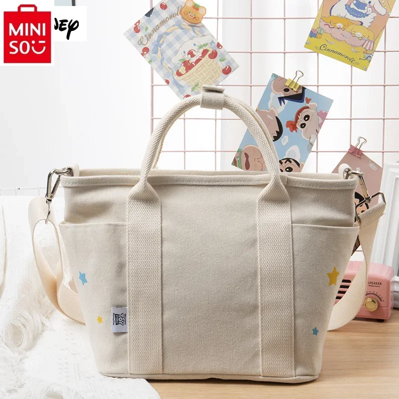MINISO Disney cartoon three eyed pendant cute handbag women's fashionable high-quality canvas carrying crossbody bag