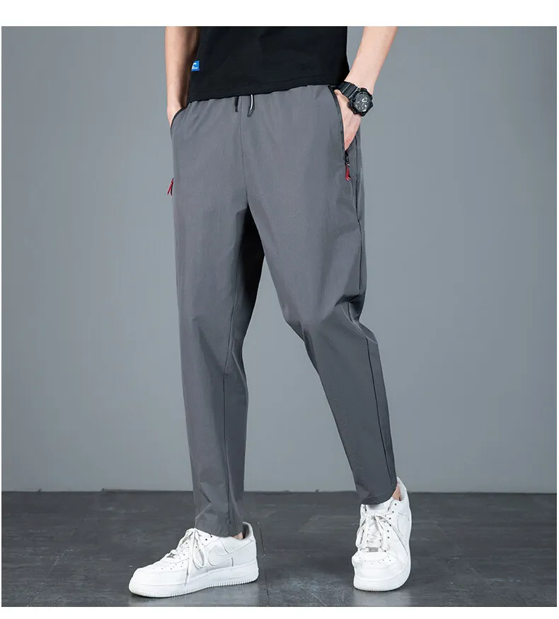 casual pants New Arrival Men's Elastic Waist Elastic Quick Drying Fabric Trousers Men Solid Harem Pant Ankle Length Thin Pants Male 918 casual joggers