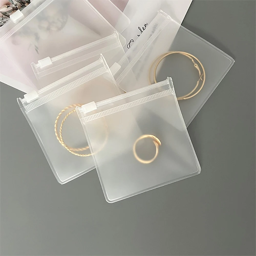 5 sacchetti di plastica trasparenti da 8x8 cm con chiusura a zip, sacchetti antipolvere per gioielli, piccoli sacchetti per orecchini, sacchetti regalo in PVC/EVA per gioielli.  36