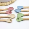 Hot selling food grade silicone wooden handle spoon and fork set for complementary food feeding training spoon and fork 2