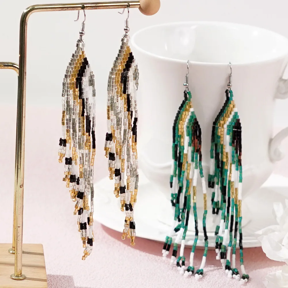 

Beaded earrings Tassel Originality Gradient Design Hand knitting Bohemia Alloy Tide Simple Rice bead earrings