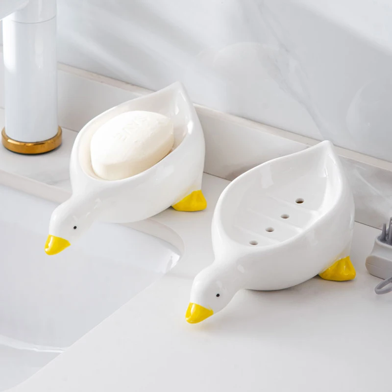 https://ae01.alicdn.com/kf/S4a5929f5ea64433c9afd732df34b5d6cJ/Self-Draining-Soap-Holder-Cartoon-Duck-Shape-Soap-Box-Plastic-Soap-Tray-Portable-Soap-Container-Soap.jpg