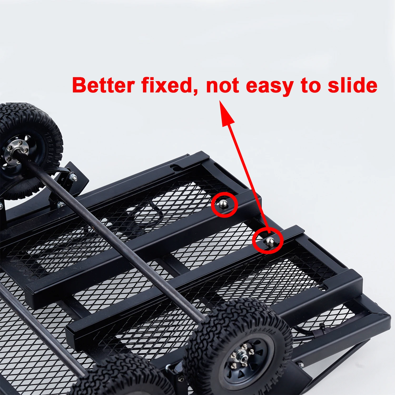 Remorque tubulaire pour crawler RC 1/10 en action avec la roue jockey télescopique déployée