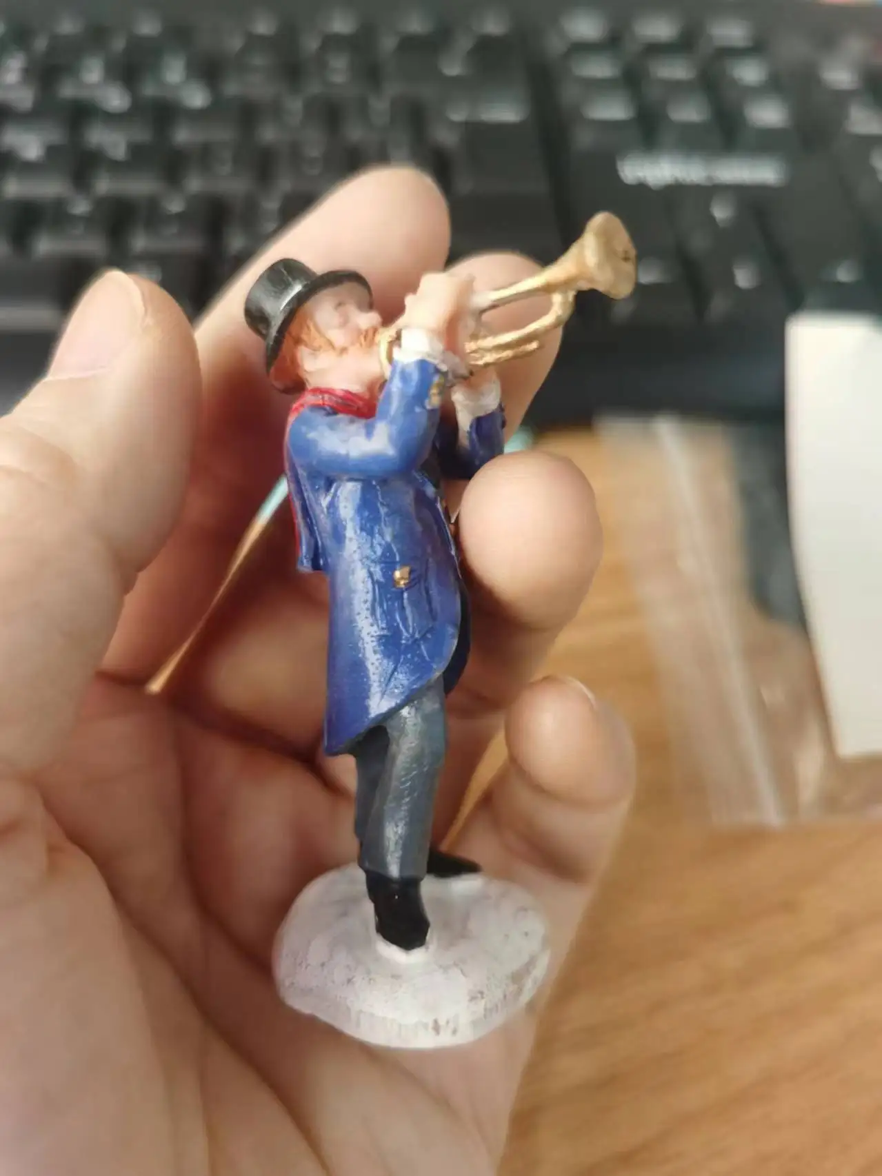 

resin figure mental psychological sand table game box court therapy man blowing a trumpet