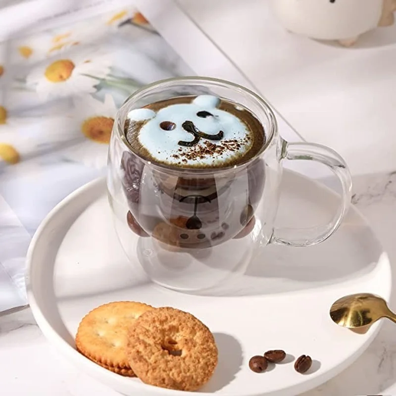https://ae01.alicdn.com/kf/S4a881bd559ad46a6a755aa3dd2f2fbf4B/250ml-Cute-Bear-Tea-Cups-Double-Glass-Milk-Coffee-Bear-Mug-with-Handle-Insulated-Espresso-Beer.jpg