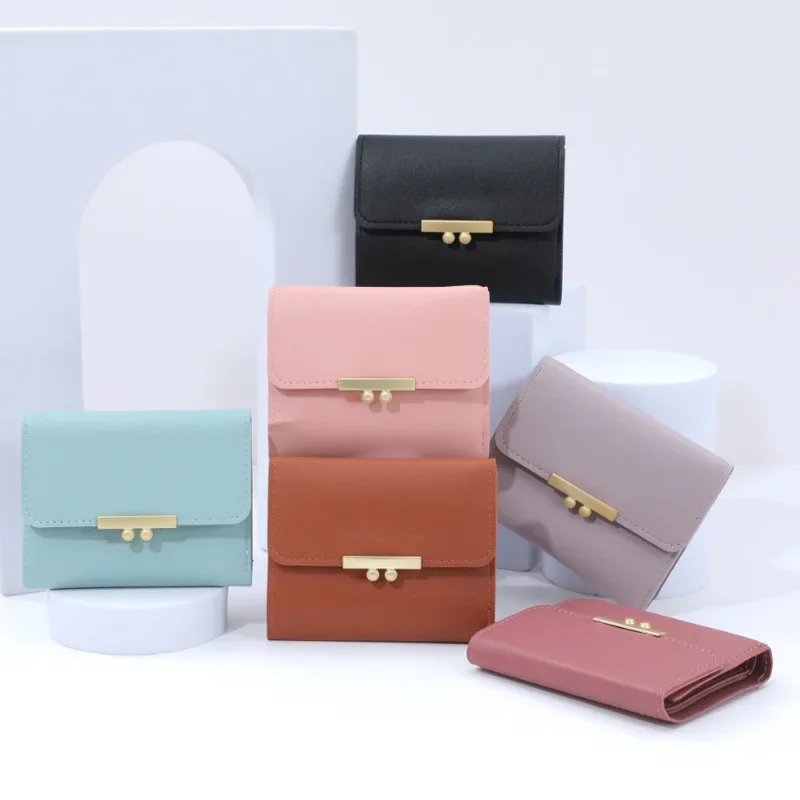 

24/5000 New wallet female junior high school students short fashion Korean version hand bag solid color matching money clip