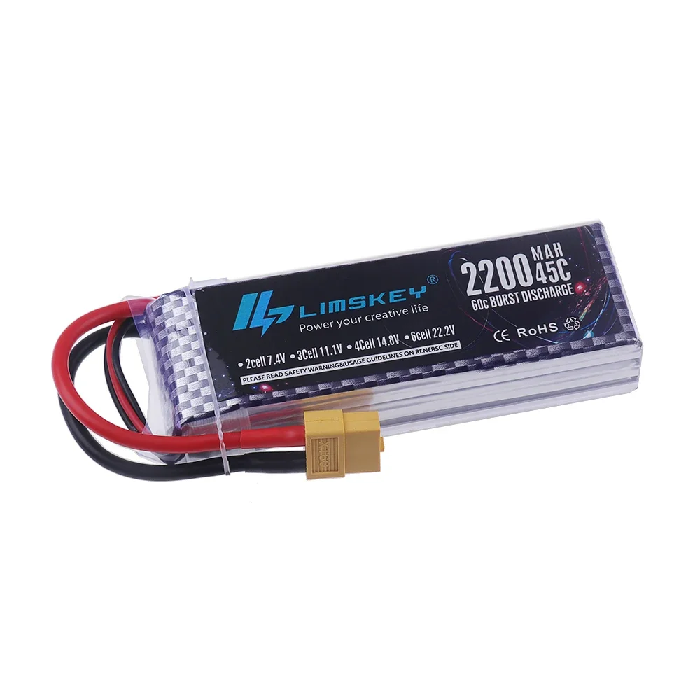 Batterie LiPo 3S 11.1V 1500mAh 20C posée à côté d'un drone RC, avec les connecteurs visibles