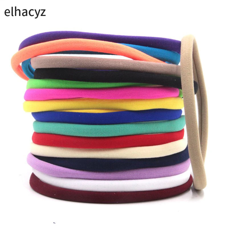 100Pcs/Lot Classic Solid Colors Elastic Nylon Headband For Baby Head Wear Girls Kids Hairband DIY Hair Accessories Wholesale 100pcs darts for nerf soft hollow hole head 7 2cm refill darts pruple bullet cliptoy gun bullets for nerf series blasters xmas