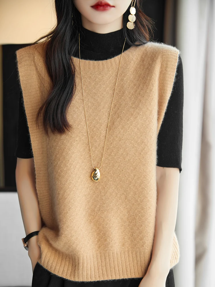 Naiste 100% meriinovillast o-kaelusega lohvaka lõikega vest S-XL 2