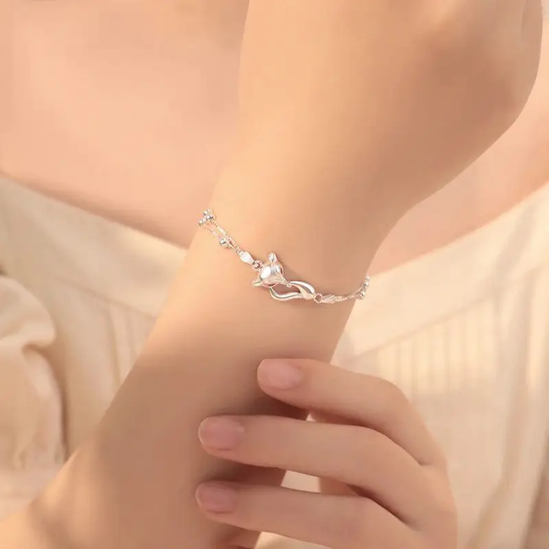 A pure silver bracelet with a small fragrance and sweet ancient fox style symbolizing a fairytale like encounter as a gift