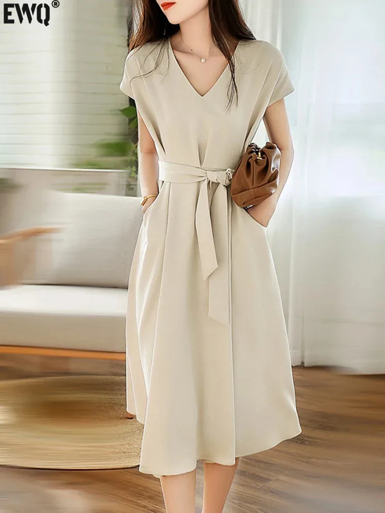 

Женское платье-пуловер с коротким рукавом, V-образным вырезом и карманами