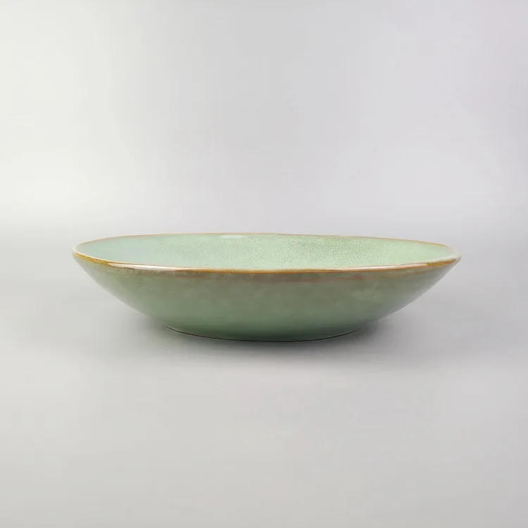 

Nordic style green kiln variable glaze irregular ceramic deep dish retro household dish