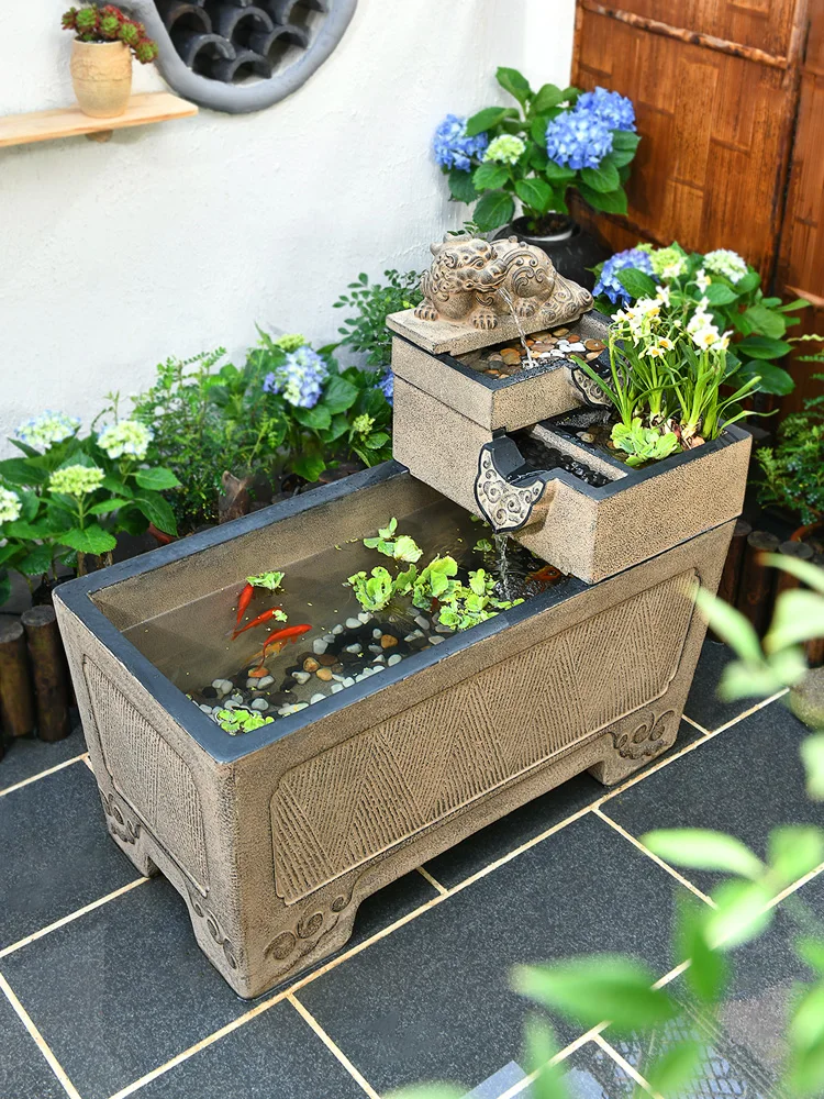 

Outdoor fish pond resin landing ancient fish tank landscaping arrangement flowing water ornament