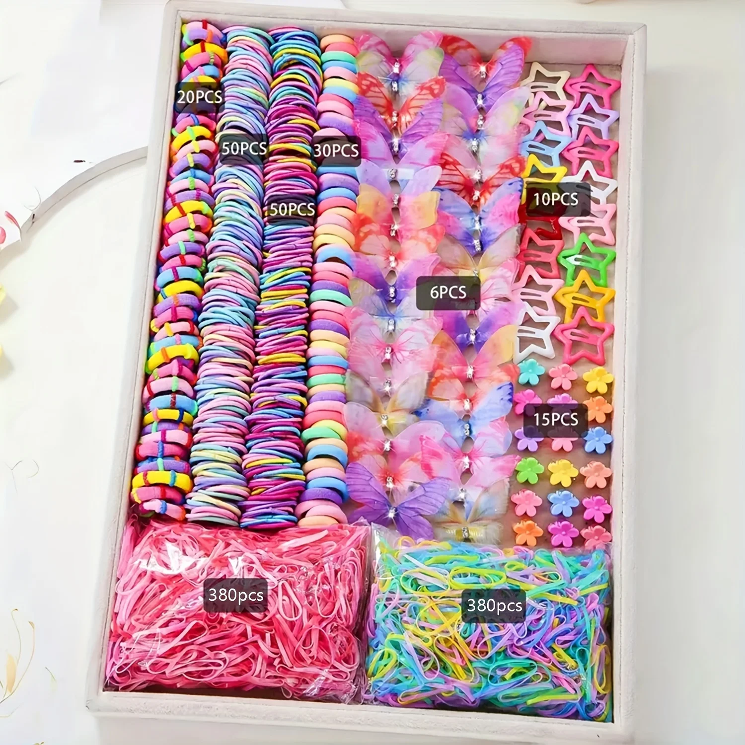 941 collection of colorful and cute clothes for girls | Includes various clips, hair ties, flowers, and double-layered bow-shaped headbands.