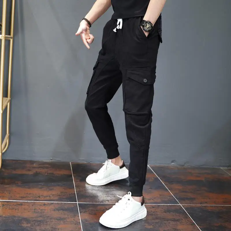 Spring Autumn New Solid Color Fashion Elastic Waist Cargo Pants Man High Street Pure Cotton Pocket Patchwork Drawstring Trousers