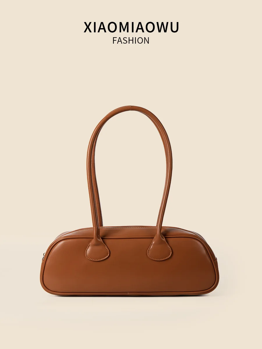 thumbnail image 1 of 2024 Bolsos de mujer Nuevo diseño de nicho Verano de alta gama Versátil Simple Gran capacidad Retro Bolso de almohada portátil Bolso de hombro, 1 of 5