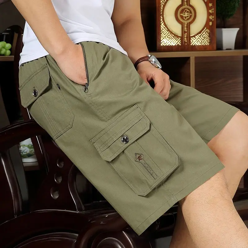 Fashion Elastic Spliced Pockets Straight Casual Shorts Men's Clothing 2024 Summer New Loose Solid Color All-match Knee Shorts