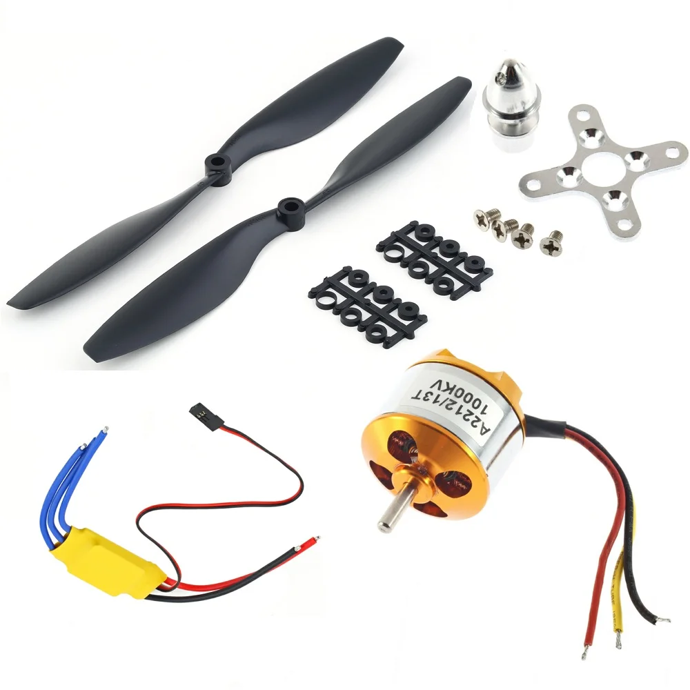 Hélice 1045 en plastique noir à côté du moteur brushless A2212 et de l'ESC 30A