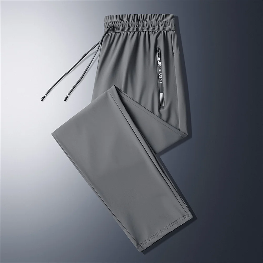 Pantalones geniales Pantalones de chándal para hombre Pantalones de moda Pantalones elásticos informales Joggers deportivos Pantalones largos finos