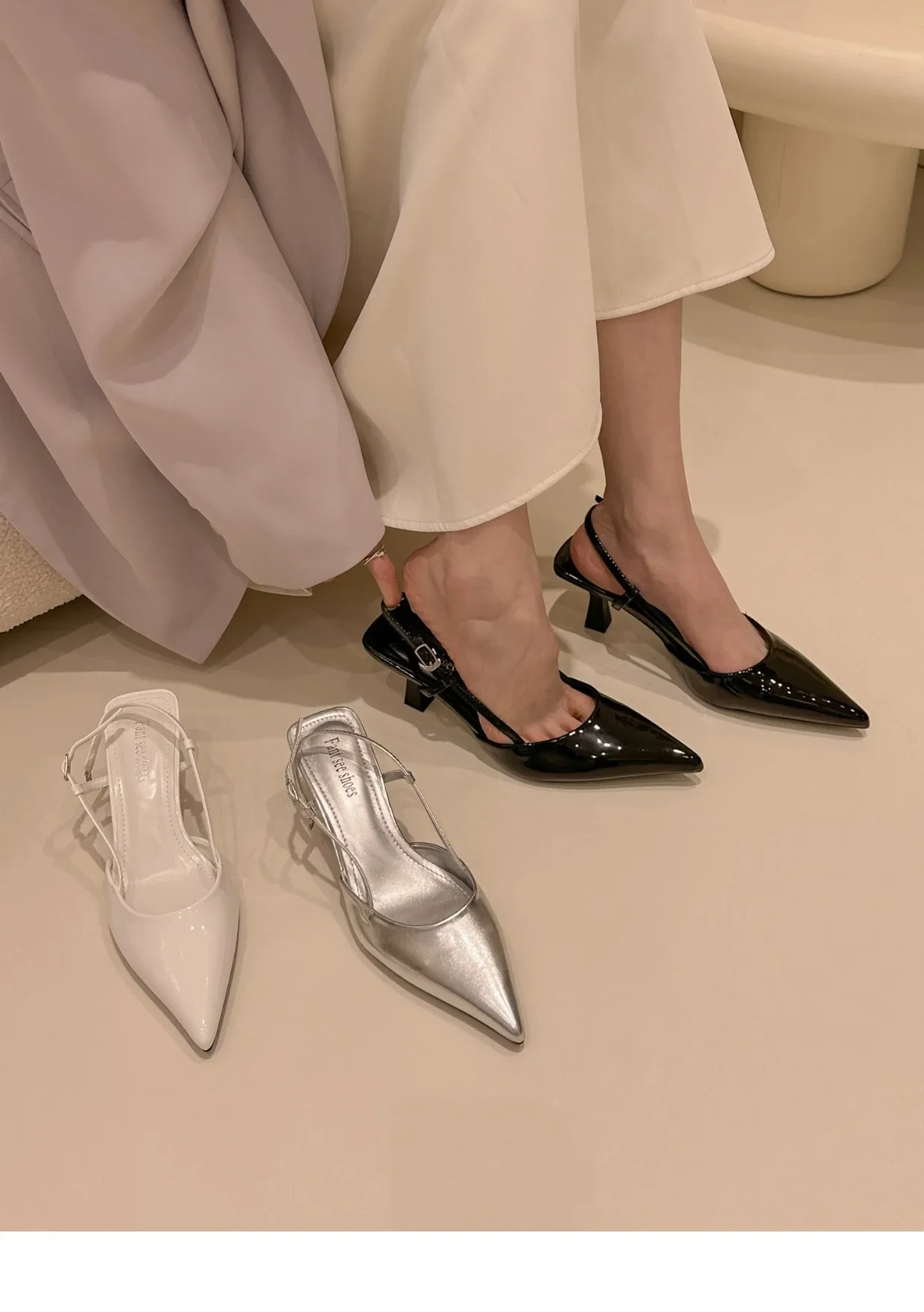 

Silver pointed high heeled sandals with thin heels, half toe, and back empty single shoes