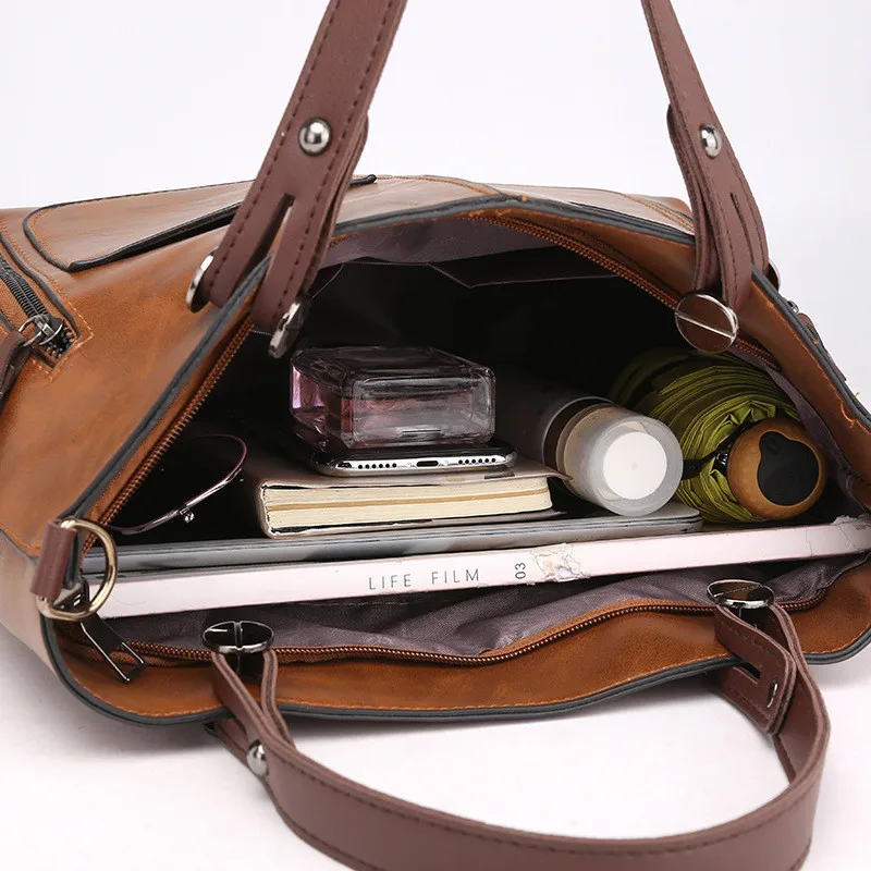 Retro leather handbag with two zipper pockets, versatile tote and crossbody style, classic women’s work and business bag. 45789