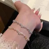 95192-169cf9.png Bracelet en alliage de zinc, bracelet fleur en zircon étincelant, bracelet fait main en alliage pour usage quotidien, accessoire de mode pour soirée