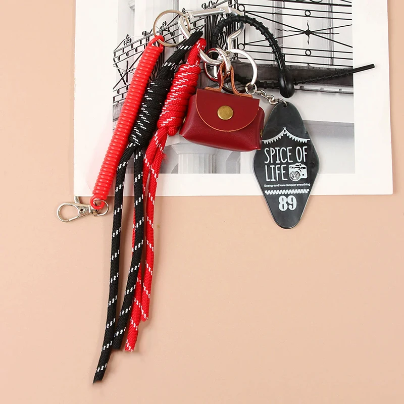 Trendy PU Leather Keychain with Exquisite Woven Rope Luggage Hanging Piece Fashionable Little Bag Pendant Accessory Gift