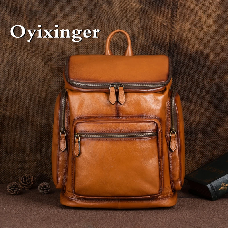 

OYIXINGER Vintage Genuine Leather Laptop Bag Men's Versatile Cowhide Backpack Large Capacity New Casual Solid Colour Travel Bag