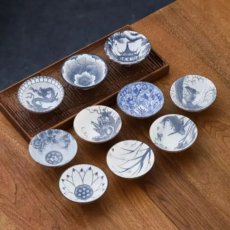 Handcrafted Blue & White Porcelain Teacup - Dragon, Phoenix, and Pavilion Design