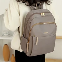 Waterproof Nylon Backpack for Women Lightweight School Backpack Multi-Pocket Travel Daypack Elegant Leisure Backpack with Gold Zipper 1