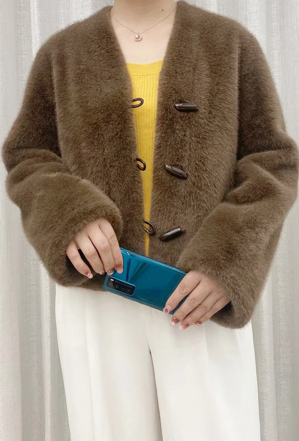 

2024 autumn and winter new V-neck wool-like warm women's coat fashion all the top