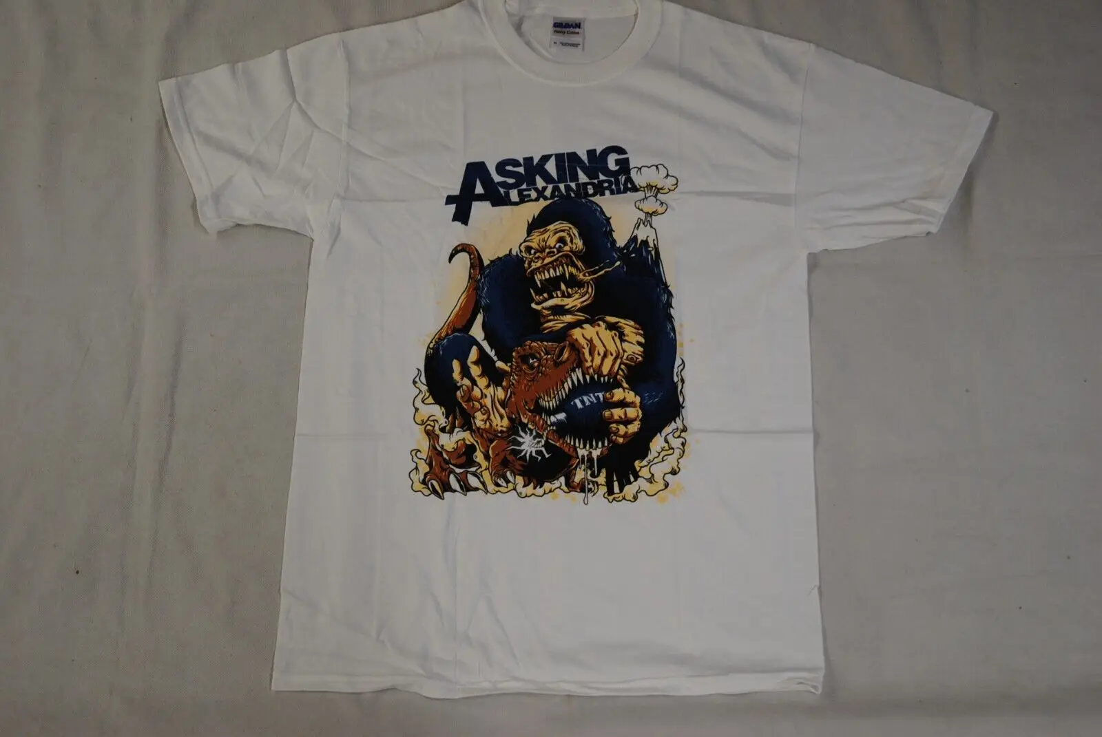 Chiedere King Kong King King-Kong Vs T. Rex Fight T Shirt New Official Rare
