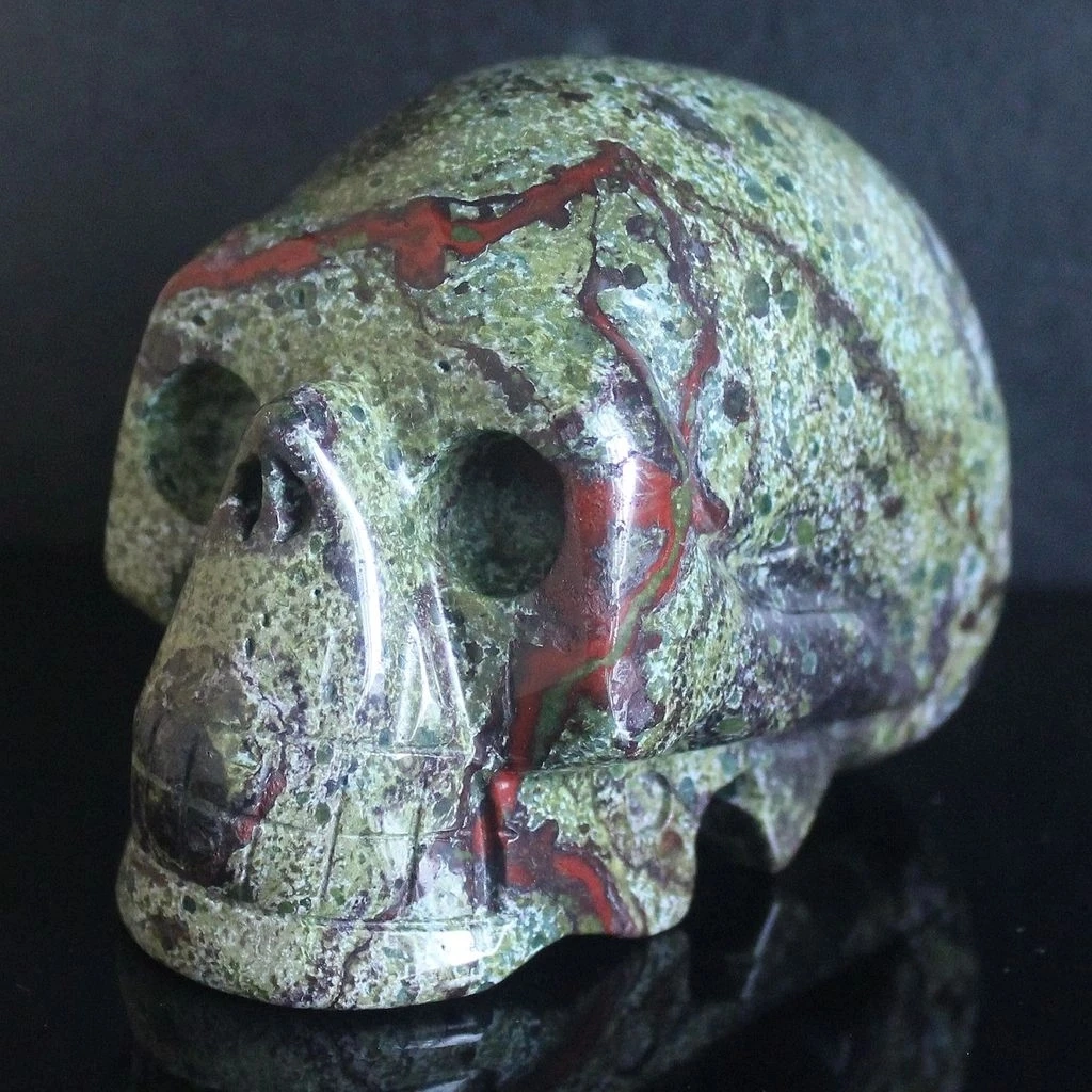 

Hand carved mixed gemstone crystal skull figurine home decor