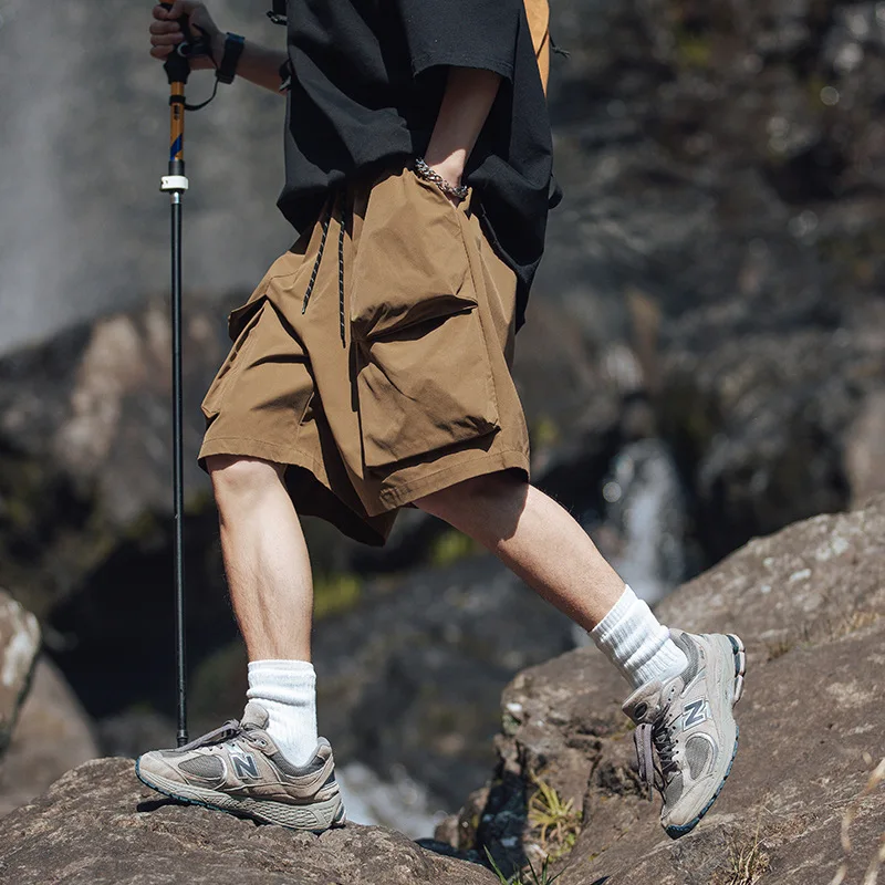 Multi pocket design three-dimensional workwear shorts trendy brand pants outdoor loose gym shorts men clothing
