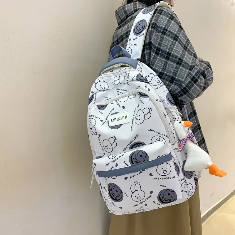 

Girls Backpack Fashion Waterproof Cute Bookbag for Teen Kawaii Schoolbag Women Mochila Nylon Cartoon Graffiti Rucksack