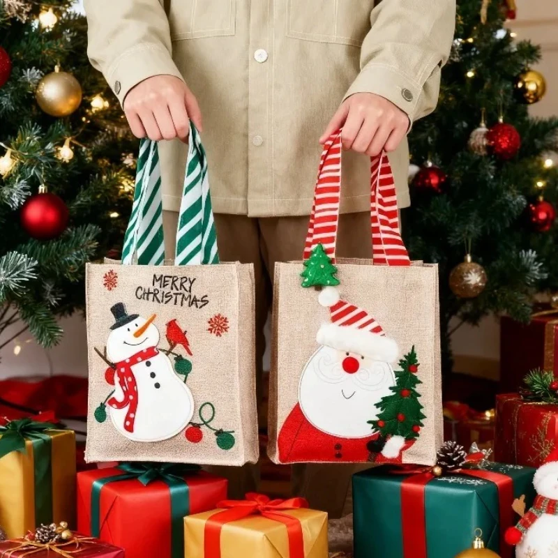 1-10PCS Christmas Burlap Gift Bags Santa Snowman Design Handheld Candy Bags for Holiday Party Favor Supplies and Decorations 1