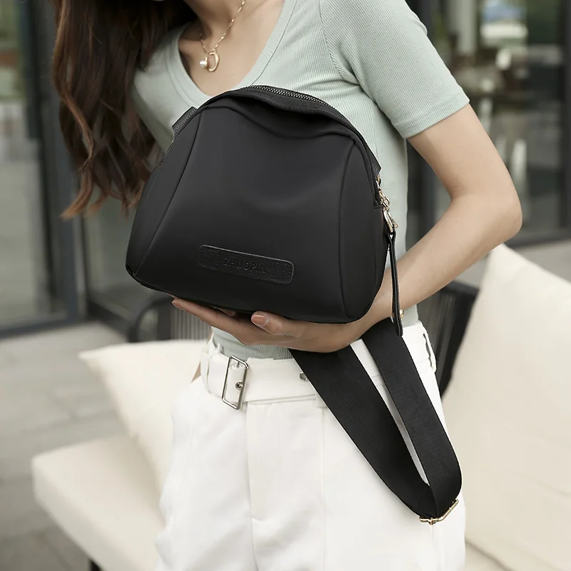 One-shoulder bag 2024 new wave girl spring and summer ladies black shell bag Oxford cloth sports wind design waterproof.