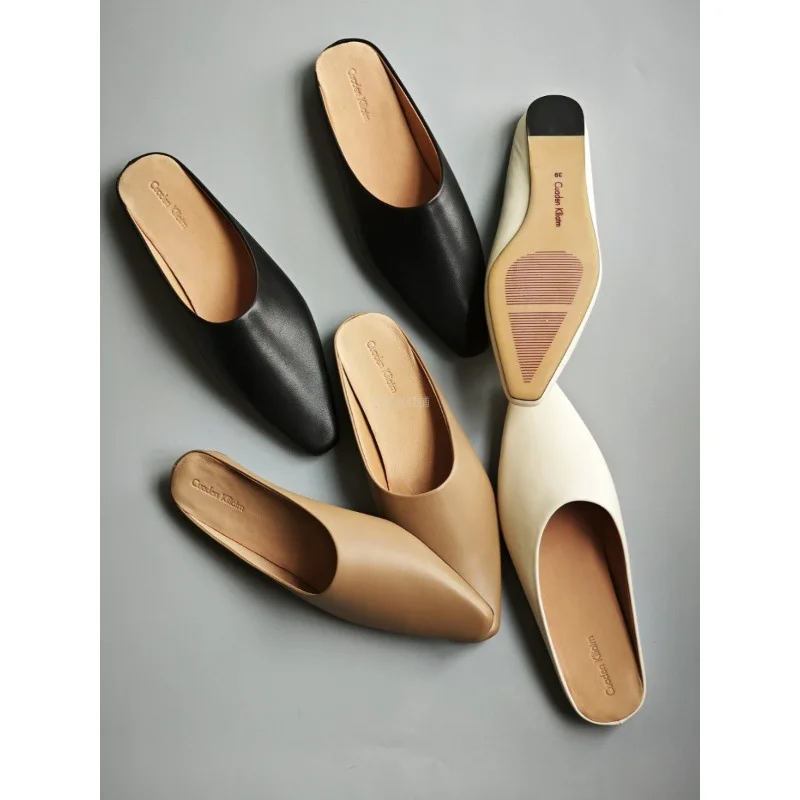 

French Muller senior sense female leather 2024 spring/summer style outside wearing pointy toe slip-on Bao head half drag