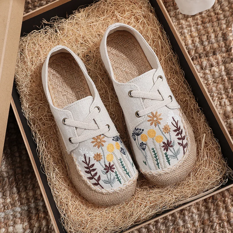 Scarpe da donna stile etnico moda primavera scarpe di lino ricamate dente di leone fondo tendine scarpe di stoffa Casual cucite a mano