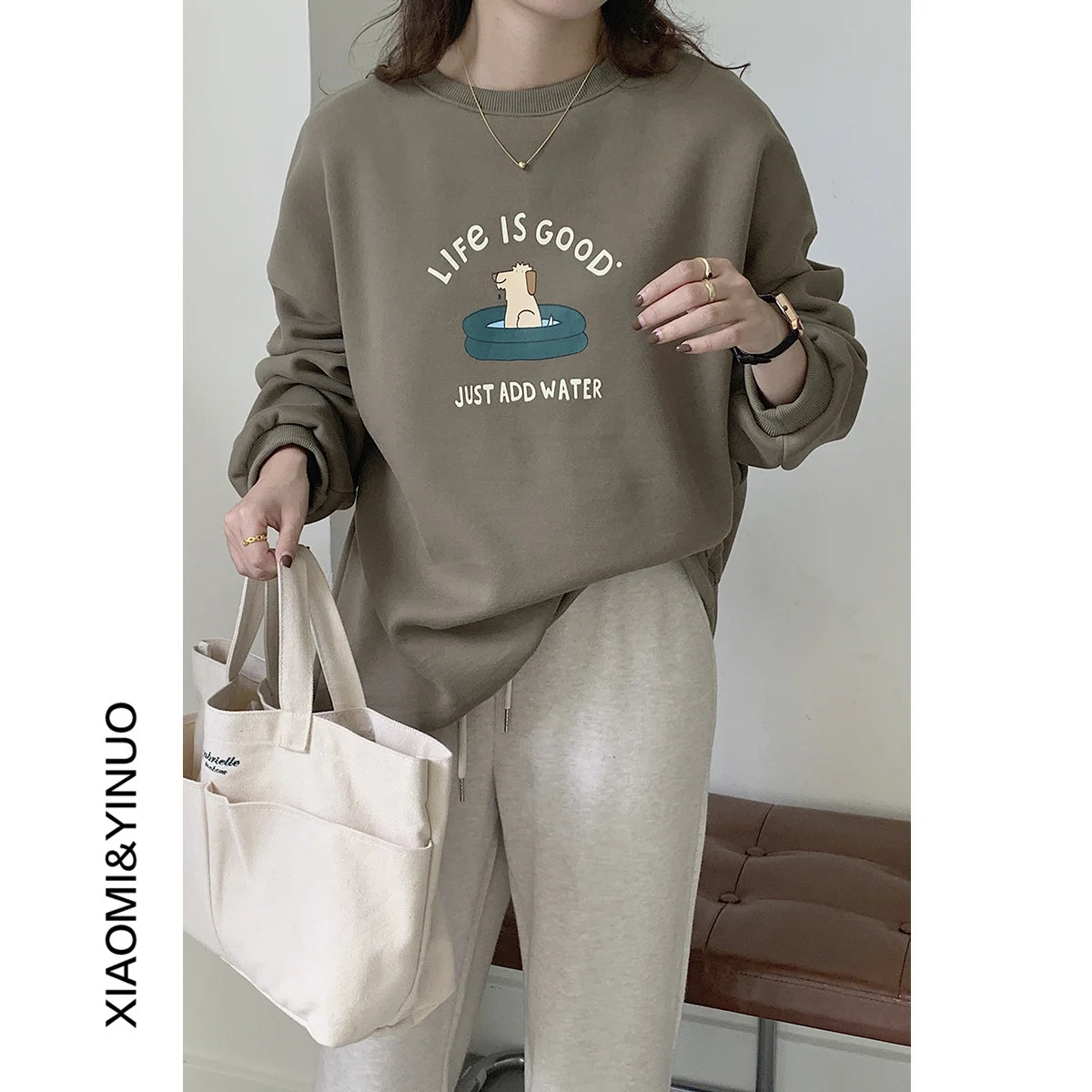 

[Ou fan]8965 fleece sweater women 2022 autumn and winter new Korean version loose printing long sleeved sweater top women