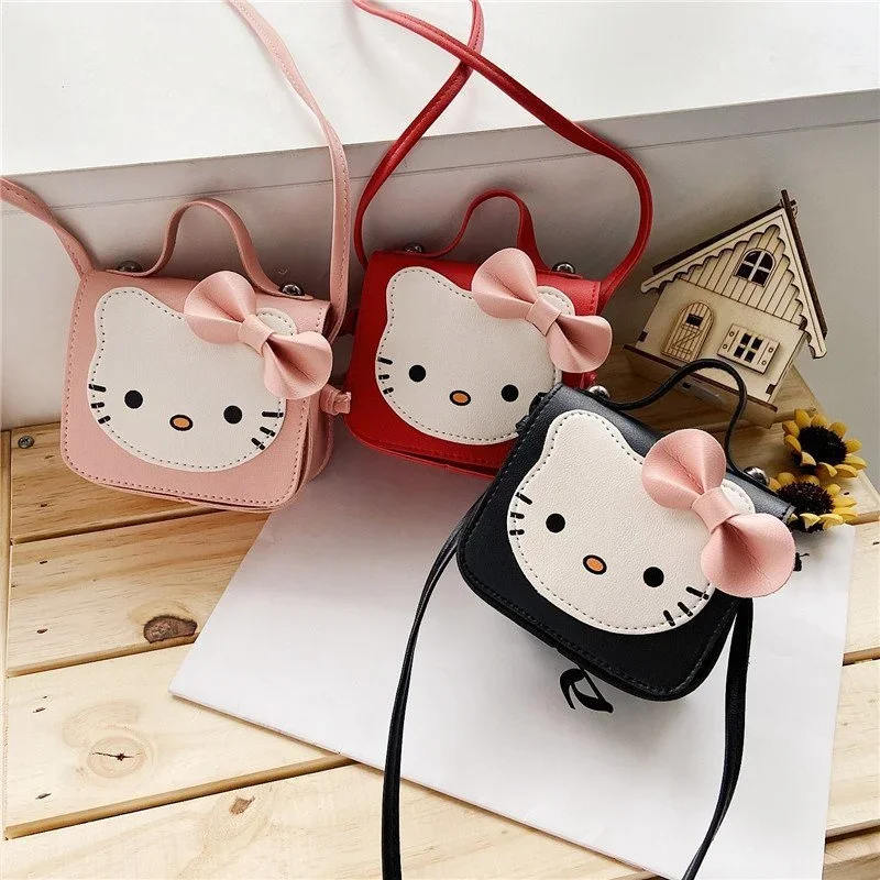 

Hello Kitty Cute Shoulder Bags Sanrio Kawaii Model Crossbody Bag for Baby Girls Fashion Bow Tie Coin Purse Kids Birthday Gifts