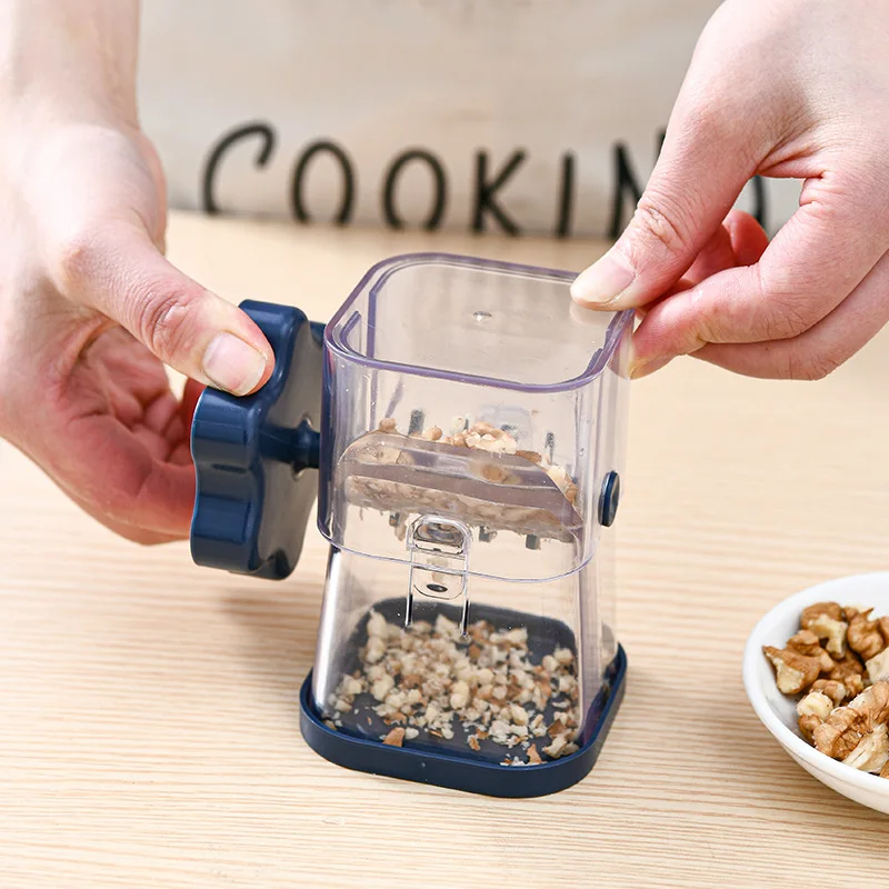 https://ae01.alicdn.com/kf/S4c409be99e2e44769c04d6655d0d5fa81/Nut-Crusher-Manual-Peanut-Paste-Masher-Portable-Dried-Fruit-Crusher-Grinder-Hand-Walnut-Chocolate-Chopper-Kitchen.jpg