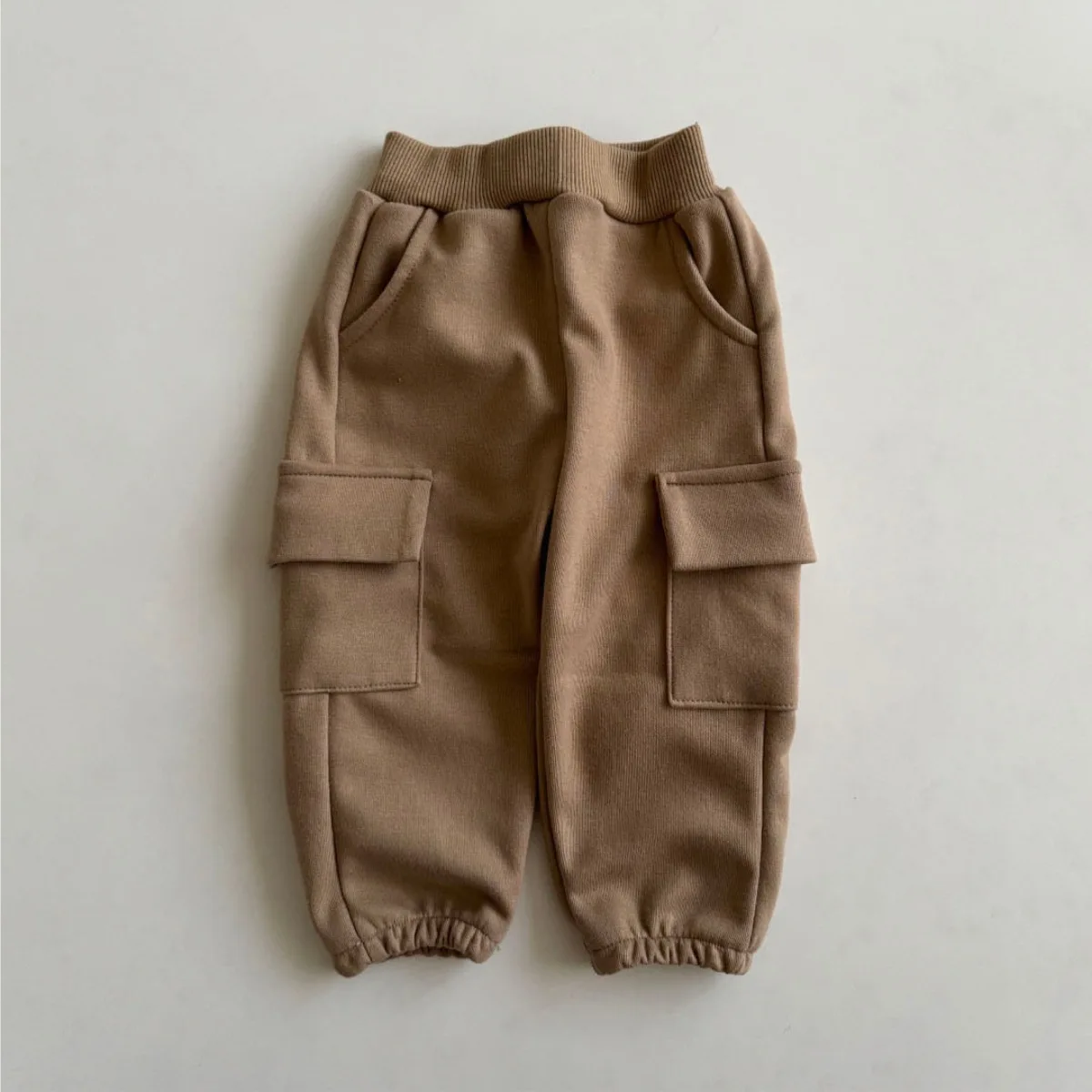 Description Picture 6 of item2025 Autumn New Baby Loose Trousers Solid Boys Casual Pants Infant Girls Jogger Pants Toddler Large Pocket Cargo Pants